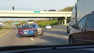 A teen was jumping from an overpass – so a cop enlisted the help of a bigrig driver [upl. by Taddeusz]