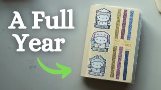 A Full Year Flip Through in My Hobonichi Cousin  2023 Planner Flip Through [upl. by Obediah364]