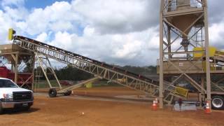 Pugmill Systems Inc 2 Bin Portable Pugmill making soil cement [upl. by Aihsenyt]