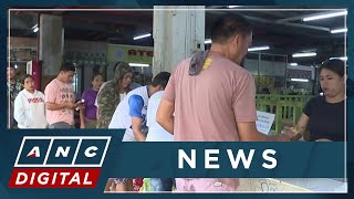 Consumers flock to local markets to purchase cheaper rice after implementation of rice price ceiling [upl. by Belva]