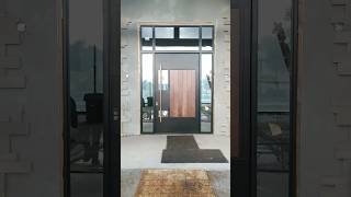 Custommade pivot door with a modern design based on the client’s specifications crafted in steel [upl. by Landes]