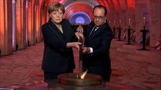 Hollande et Merkel dans la nef de lossuaire de Douaumont [upl. by Diskson]