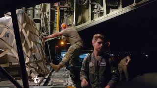 An Air Force Reserve loadmaster and Aerial Port member load a pallet onto a C130H Hercules [upl. by Alliber]