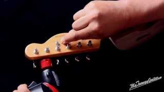 How To String A Guitar with Slotted Tuners [upl. by Fredek741]