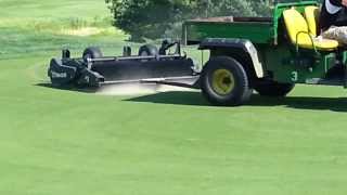 Golf Course greens aeration  brushing in the sand [upl. by Nanerb]