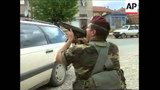 YUGOSLAVIA KOSOVO KFOR TROOPS PROTECT SERB FAMILY [upl. by Lacim]