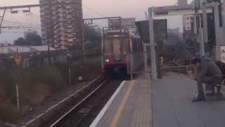 DLR quotRide With Pridequot Liveried Train Departs Shadwell For Beckton [upl. by Annaitat442]