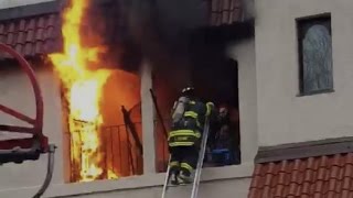 Firefighters Rescue Man from Burning Apartment [upl. by Oihsoy]