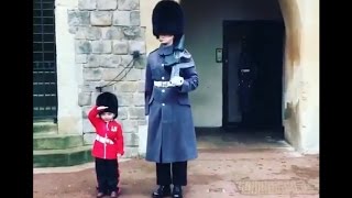 Boy Dressed as British Guard Salutes Windsor Castle Soldiers [upl. by Dolores191]