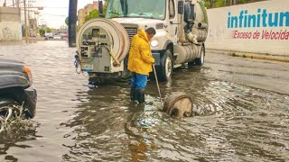 Sewer Saviors Unclogging Flooded Drains to Save the Street [upl. by Agretha975]