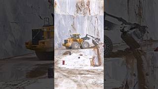 Volvo wheel loader navigates narrow path in marble quarry shorts construction excavator [upl. by Evie]