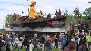 Giant puppets parade through Montreal [upl. by Trebbor]