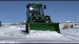 John Deere 1025R Warm Cab Satisfying Snow Removal [upl. by Enilauqcaj396]