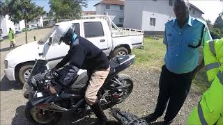 Kenya Traffic Police Trying Out A Sportbike GSXR 600 [upl. by Ydnim]