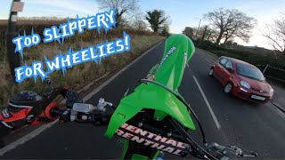 KX450F WHEELIE PRACTICE ON WET ICY ROADS [upl. by Nyrmac]