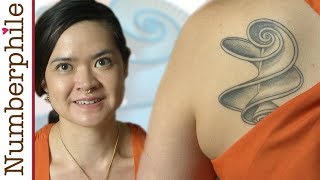 The Girl with the Hyperbolic Helicoid Tattoo  Numberphile [upl. by Idnahs600]