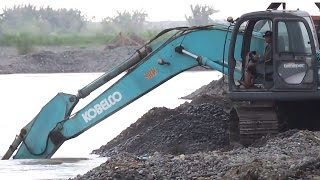 Excavator Kobelco SK200 Dredging Sand Loading Dump Truck [upl. by Norraa]