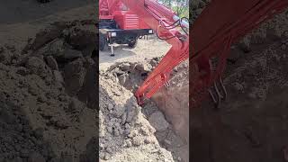 Excavator digging with vehicle fourwheel drive agricultural vehicle multipurpose machine s [upl. by Griselda]