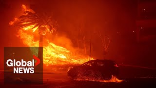 Malibu wildfire explodes in size forcing evacuations and destroying homes [upl. by Clein440]