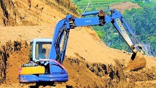 Mini Excavator Moving Dirt At The Geothermal Power Plant Geo Dipa Dieng Plateu Komatsu PC75UU [upl. by Ynnahc]