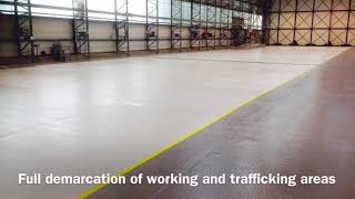 Skydrol resistant resin floor coating applied in a helicopter maintenance hangar [upl. by Akire655]