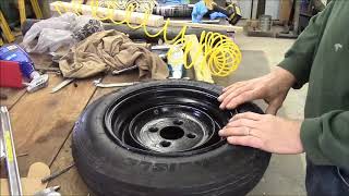 How to easily mount a trailer tire DIY trailer tire mounting [upl. by Otes]