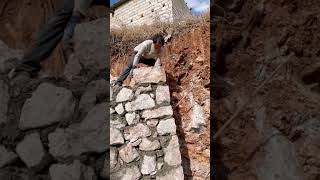 Stone concrete retaining wall construction process [upl. by Ilak352]