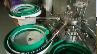 Automatic aerosol can actuator valve element assembly machine [upl. by Aivitnahs]