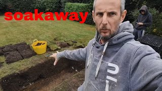 installing soakaway drain in garden [upl. by Eneja]