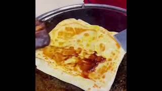 Eggfilled pancake（鸡蛋灌饼）is a popular delicacy in China [upl. by Sells]