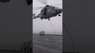 Sailors abord the aircraft carrier particopate with a vertical replesnishment at sea shorts [upl. by Magdaia]