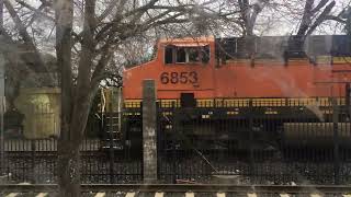 Locomotive Bell Battle BNSF 6853 Manifest Northbound passes through Broadway 2nd Ave and 21st St [upl. by Alyn]