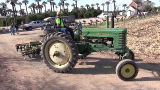 A Deere And A Couple Of Horses Discing A Field At The AEDGEampTA Show 2814 [upl. by Auqenat]