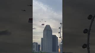 NDP 2024 NE1 Helicopters Flag Flypast singapore ndp2024 marinabaysingapore singaporeflyer [upl. by Foskett]