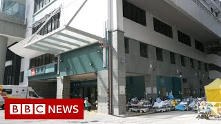 Hong Kongs hospitals overwhelmed amid spike in Covid cases  BBC News [upl. by Cotter907]