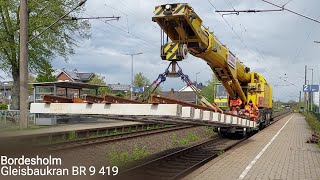 Bordesholm Vorbeifahrt STRABAG Gleisbaukran KRC 910 BR 9419 aka auf Betriebsfahrt [upl. by Fernas398]