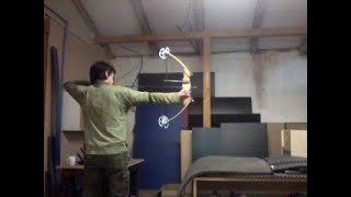 Shooting 295quot 55lbs homemade wooden compound bow [upl. by Dorcy268]