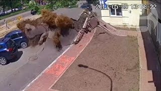 Underground water pipe explosion destroys road in Ukraine [upl. by Fahey515]