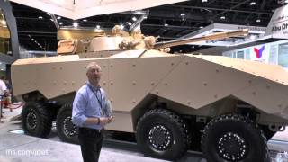 IDEX 2015 Christopher Foss talks about the Emirate Defense Technology Enigma 8x8 armoured combat veh [upl. by Seana]