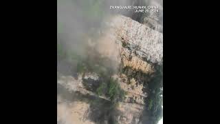 Speeding falcon strikes drone in dramatic Zhangjiajie aerial clash [upl. by Reidar]