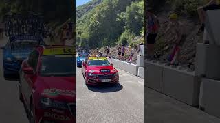 Simon Yates throws his water bottle to a kid while climbing the Col de Grand Colombier TDF Stage 13 [upl. by Fotzsyzrk]