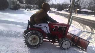 Wheel horse plowing snow [upl. by Seerdi]