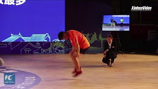 Chinese teenager breaks own record in jump rope contest [upl. by Cleve]