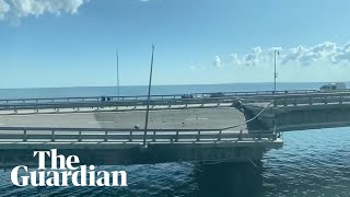 Crimea bridge appears damaged amid reports of explosions [upl. by Hanej506]