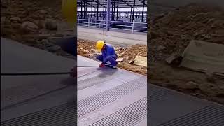 A worker texturizes a concrete pavement [upl. by Lenci]