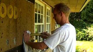 Dense pack cellulose insulation from exterior redwood siding [upl. by Letsyrc]