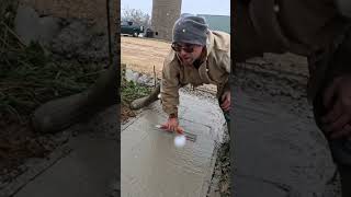 Hand troweling concrete sidewalk to root cellar [upl. by Napier]