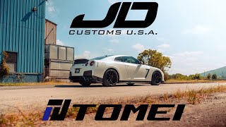 Nissan R35 GTR Tomei Exhaust Install  4K [upl. by Eyatnod]