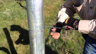 Tying Barb wire to a Strainer Post [upl. by Yrek]