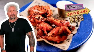 Guy Fieri Eats quotWeirdquot Pizza amp Wings in Memphis TN  Diners DriveIns and Dives  Food Network [upl. by Luoar]